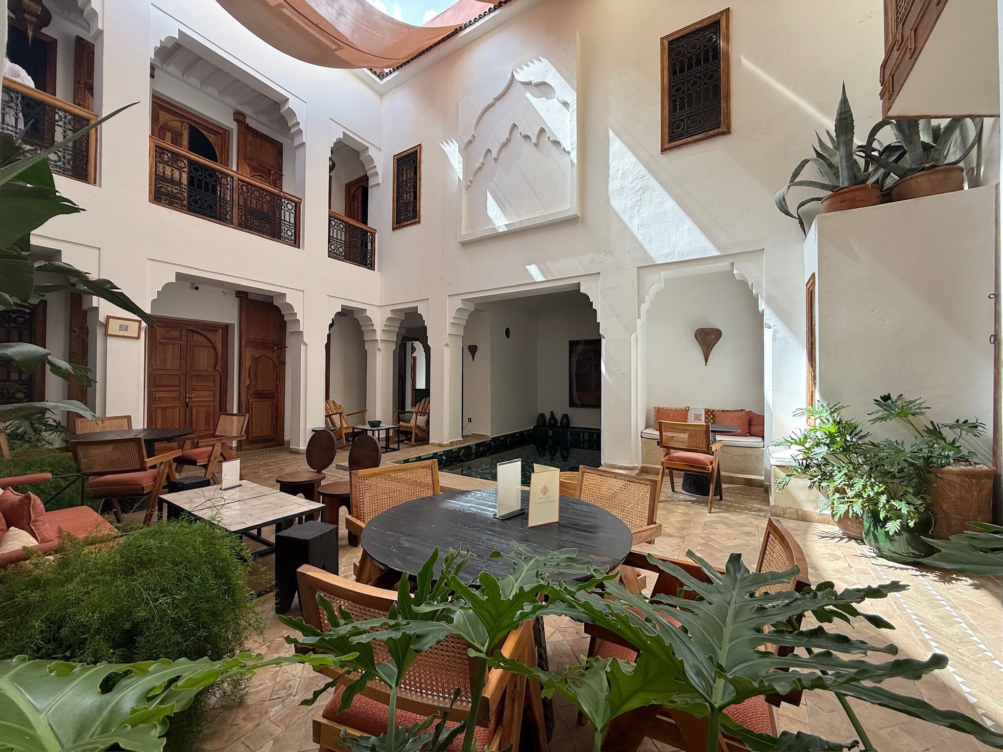 The light-filled courtyard lounge at Riad RK and Spa